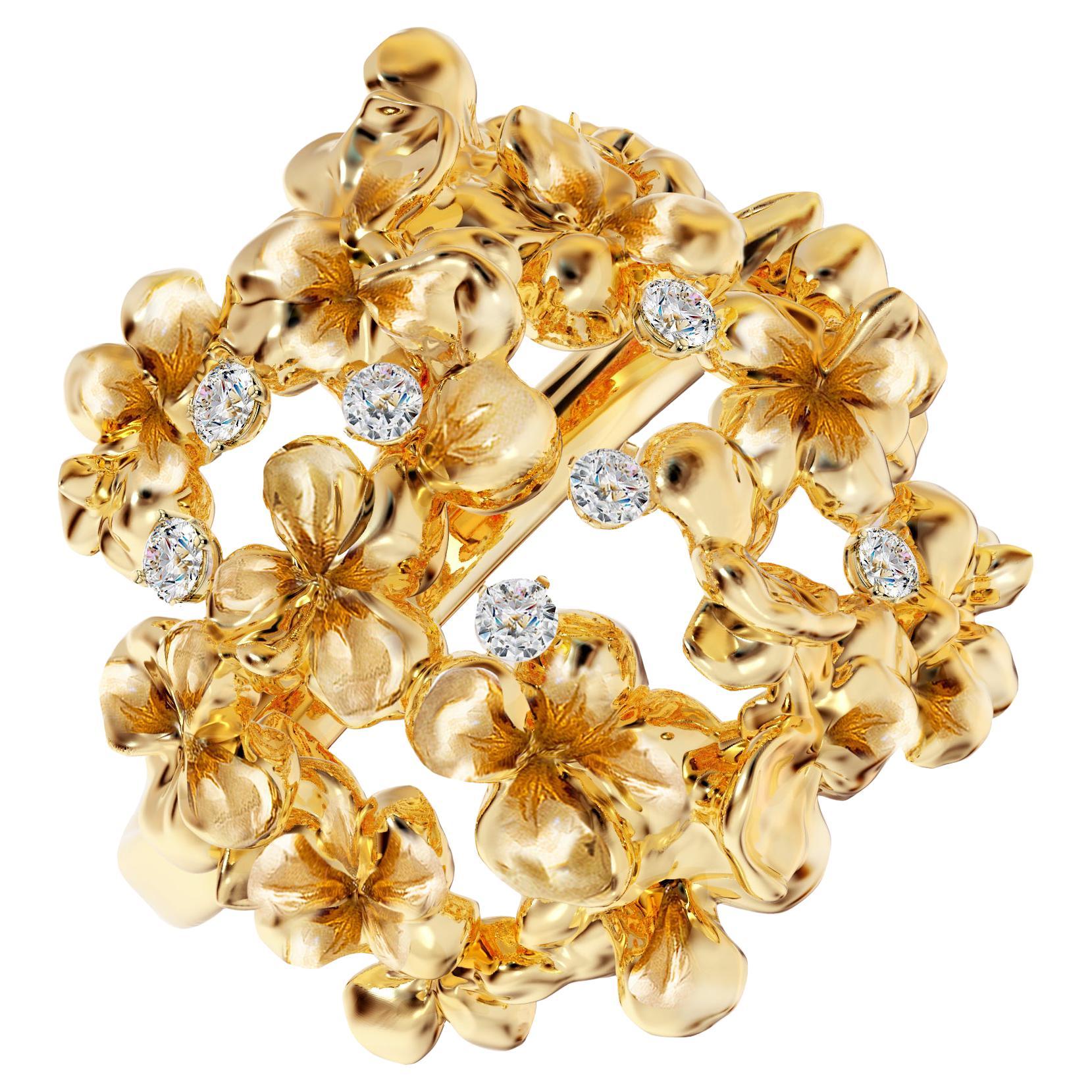 This contemporary Hortensia floral brooch is crafted from 18 karat yellow gold and adorned with seven round natural diamonds (VS, F-G). The sculptural design adds extra highlights to the surface of the gold, while the diamonds add a delicate