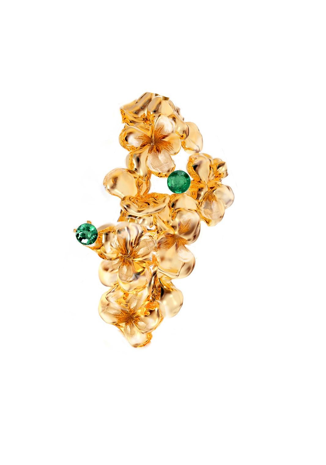 This contemporary Hortensia floral stud earrings are in 18 karat yellow gold with round natural green emeralds. The abstract sculptural design adds the extra highlights to the surface of the gold. The gems add the delicate blinks of colour. This