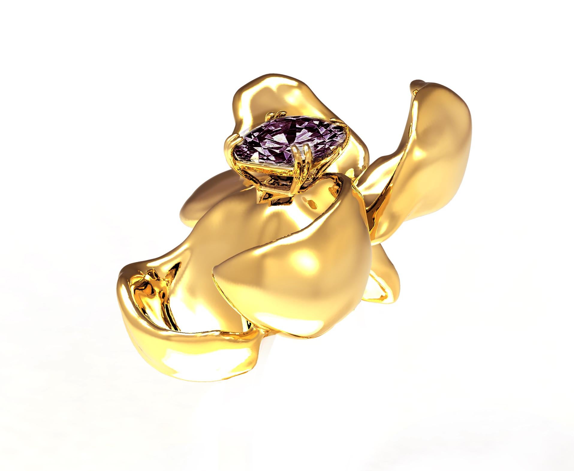 This Magnolia Flower contemporary brooch is made of 18 karat yellow gold and features a storm purple cushion spinel (1.38 carats). The tender water-surface of the spinel multiplies the light, reflecting on the golden petals. The weight is