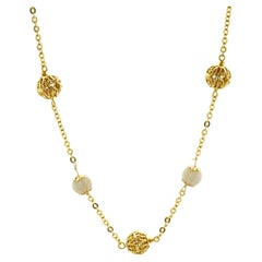 18 Karat Yellow Gold Coral Beaded Station Necklace