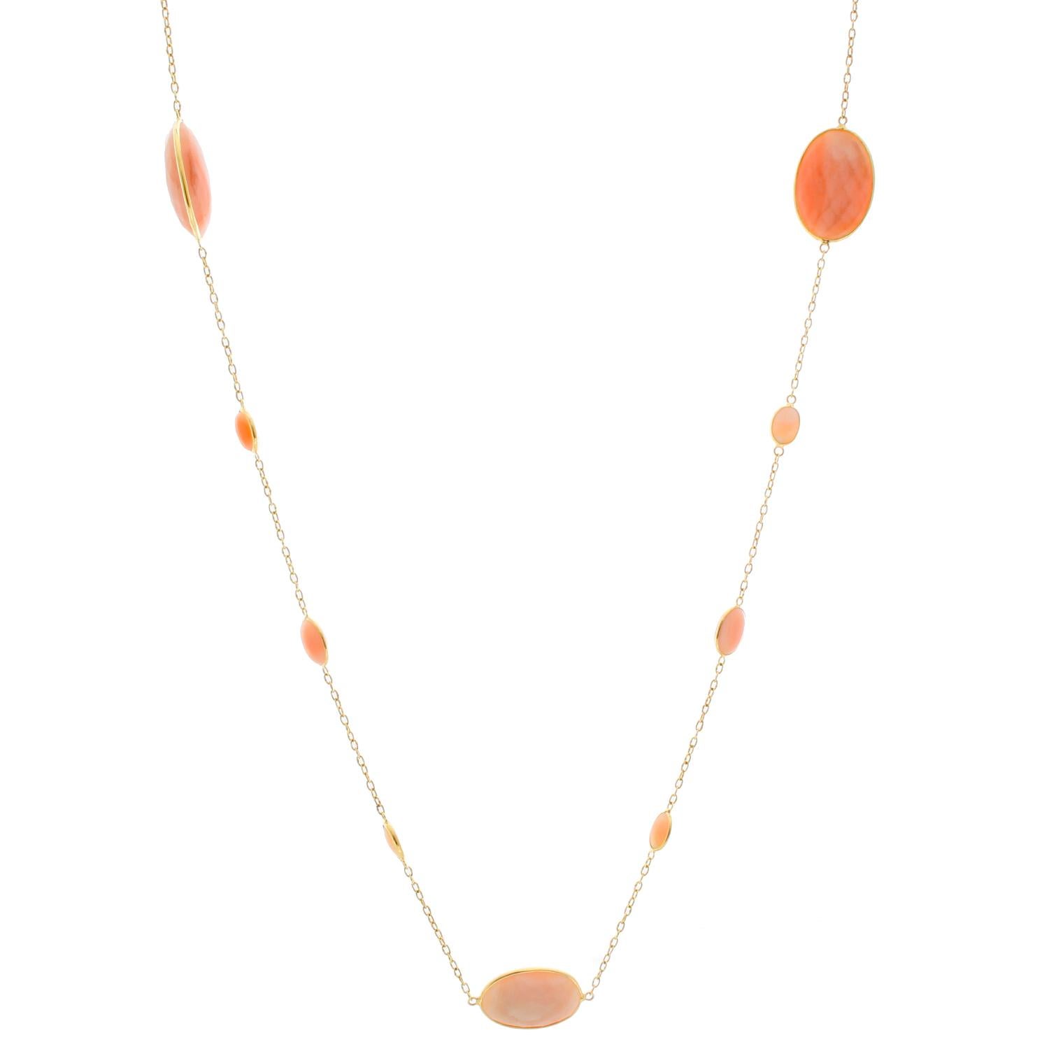 18K Yellow Gold Coral Necklace - This beautiful coral necklace measures 19 inches and features various oval sizes. There are tiny circle links in 18k yellow gold separating each coral piece. New with DeMesy box.