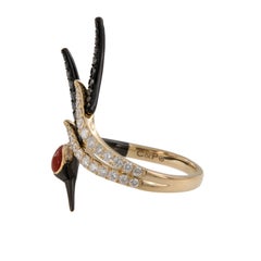18 Karat Yellow Gold Crane Ring with Coral Black Diamonds and White Diamonds