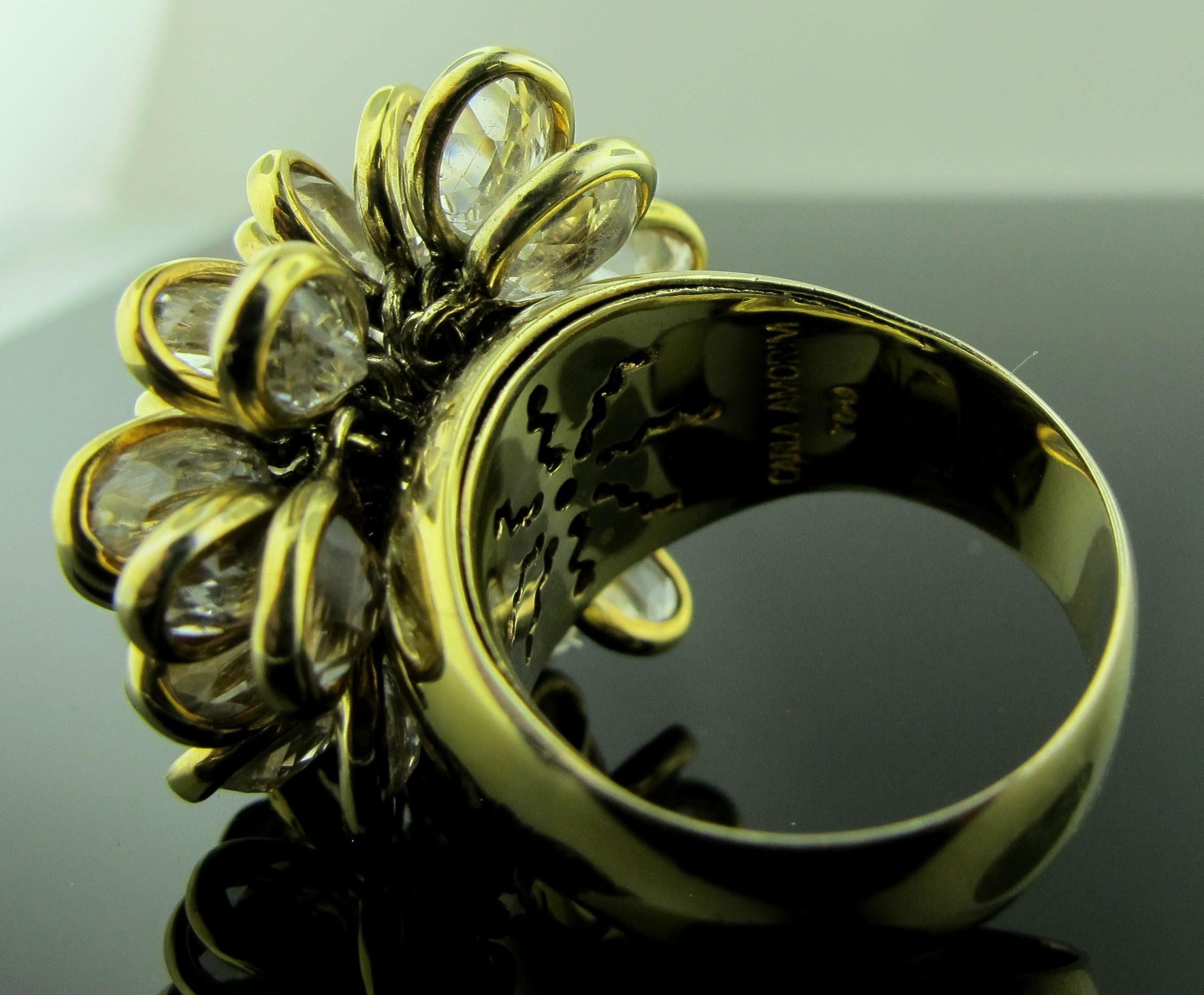 Oval Cut 18 Karat Yellow Gold and Crystal Floral Moving Ring, Signed Carla Amorim
