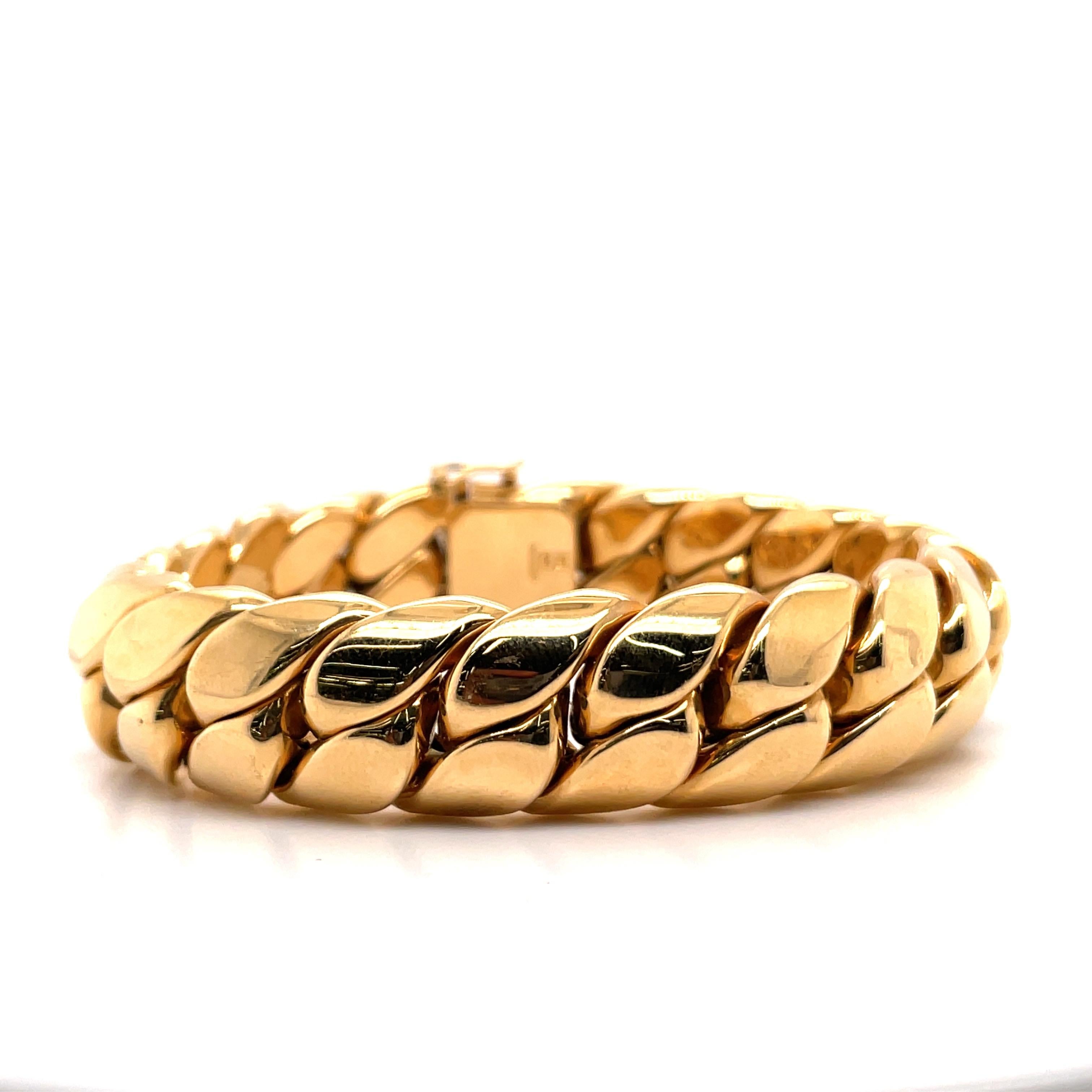 18 Karat Yellow gold Cuban link bracelet weighing 80.4 grams.
The width is 5/8 wide. 
