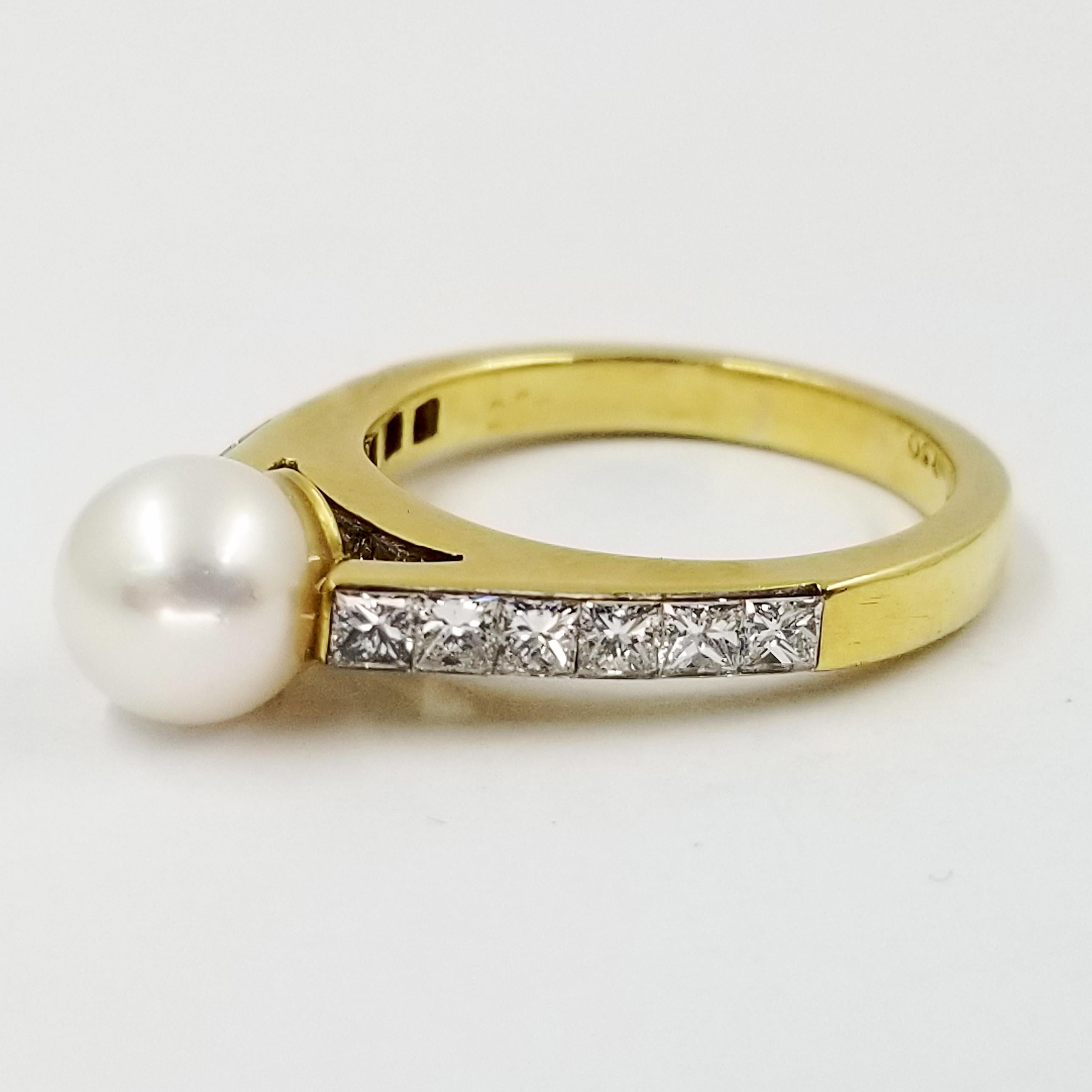 18 Karat Yellow Gold Ring From Designer Quadrillion. The Ring Features a 7mm Round White Pearl Floating Above the Cathedral Mounting. The Mounting Contains 15 Princess Cut Diamonds Totaling Approximately 1.5 Carats of VVS Clarity & F Color. Finger