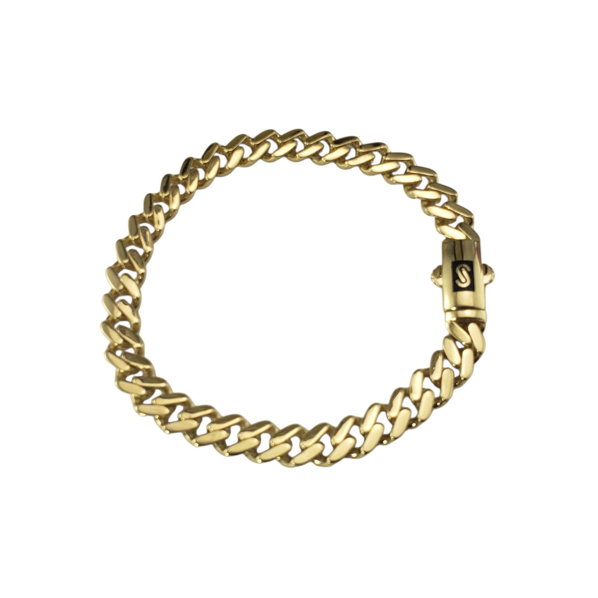18 Karat Yellow Gold Curb Link Bracelet-

Elevate your jewelry collection with this stunning curb link bracelet, meticulously crafted in 18K yellow gold. The flat, interlocking curb links offer a smooth and flexible feel on the wrist, combining