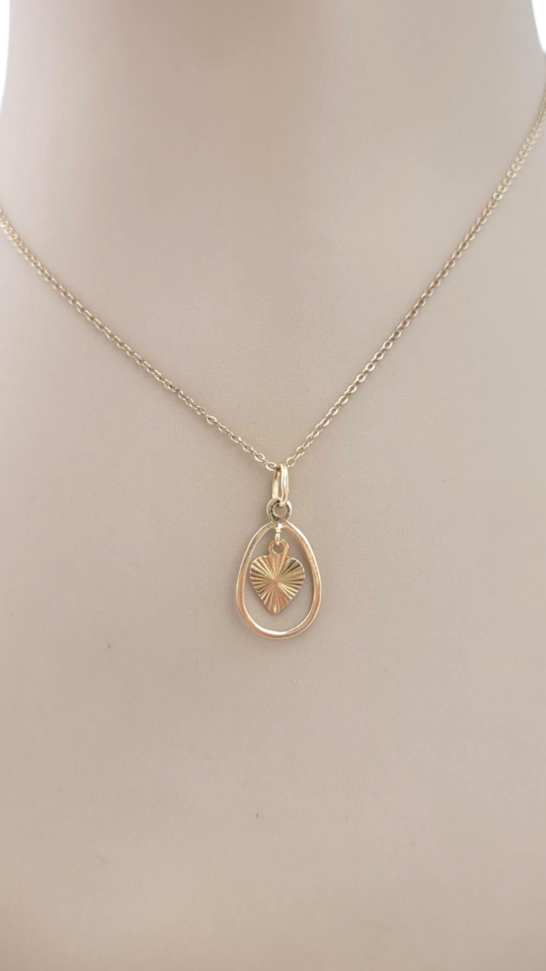 Donna 18 Karat Yellow Gold Dangle Heart Pendant #21638 in vendita