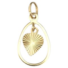 18 Karat Yellow Gold Dangle Heart Pendant #21638