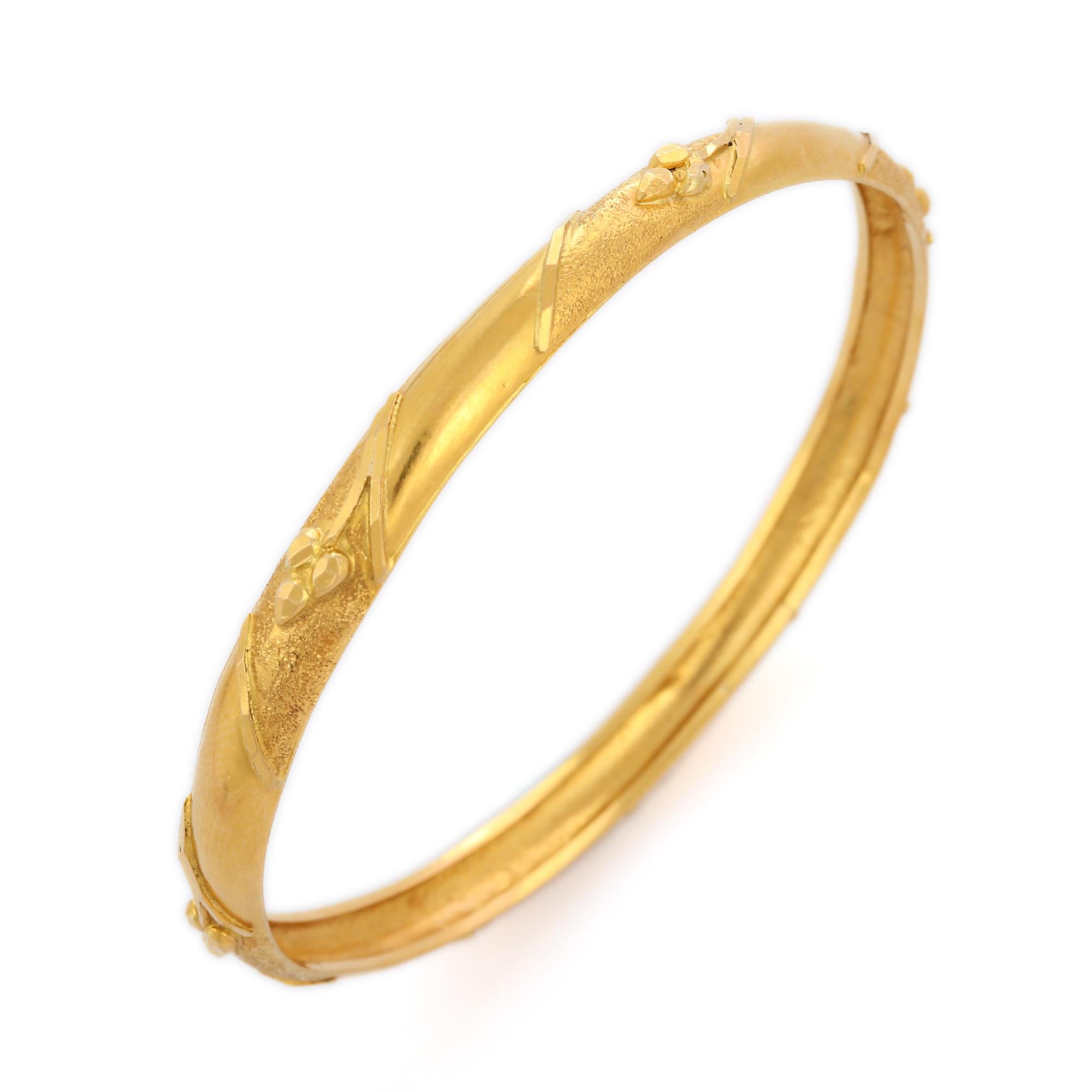 designer gold bangle