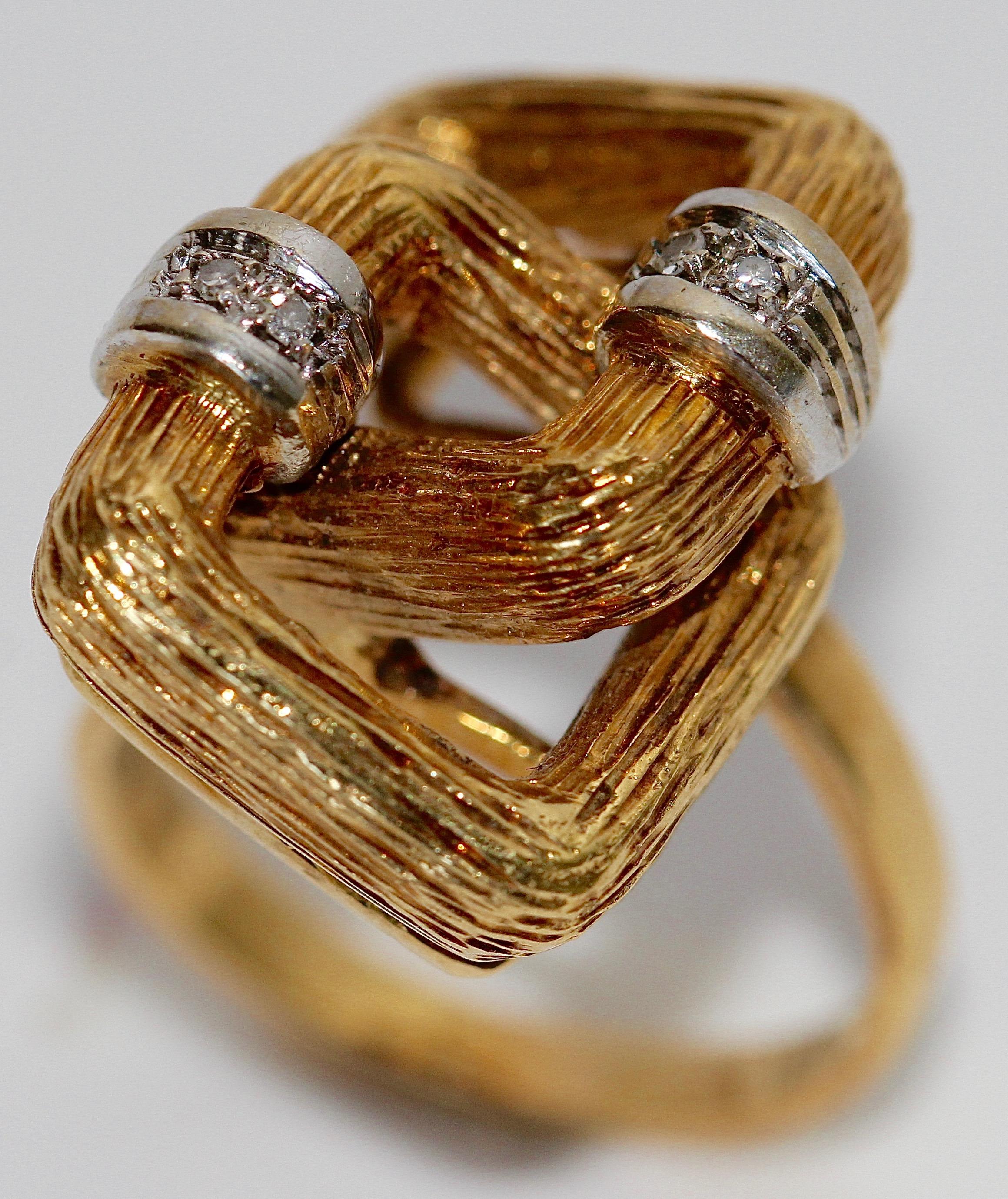 18k yellow gold designer ring set with small diamonds.
Ring size (diameter) 17mm. Rather for petite fingers.