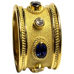 Georgios Collections 18 Karat Yellow Gold Diamond and 1.30 Carat Sapphire Ring Georgios Collections 18 Karat Yellow Gold Diamond and 1.30 Carat Sapphire Ring