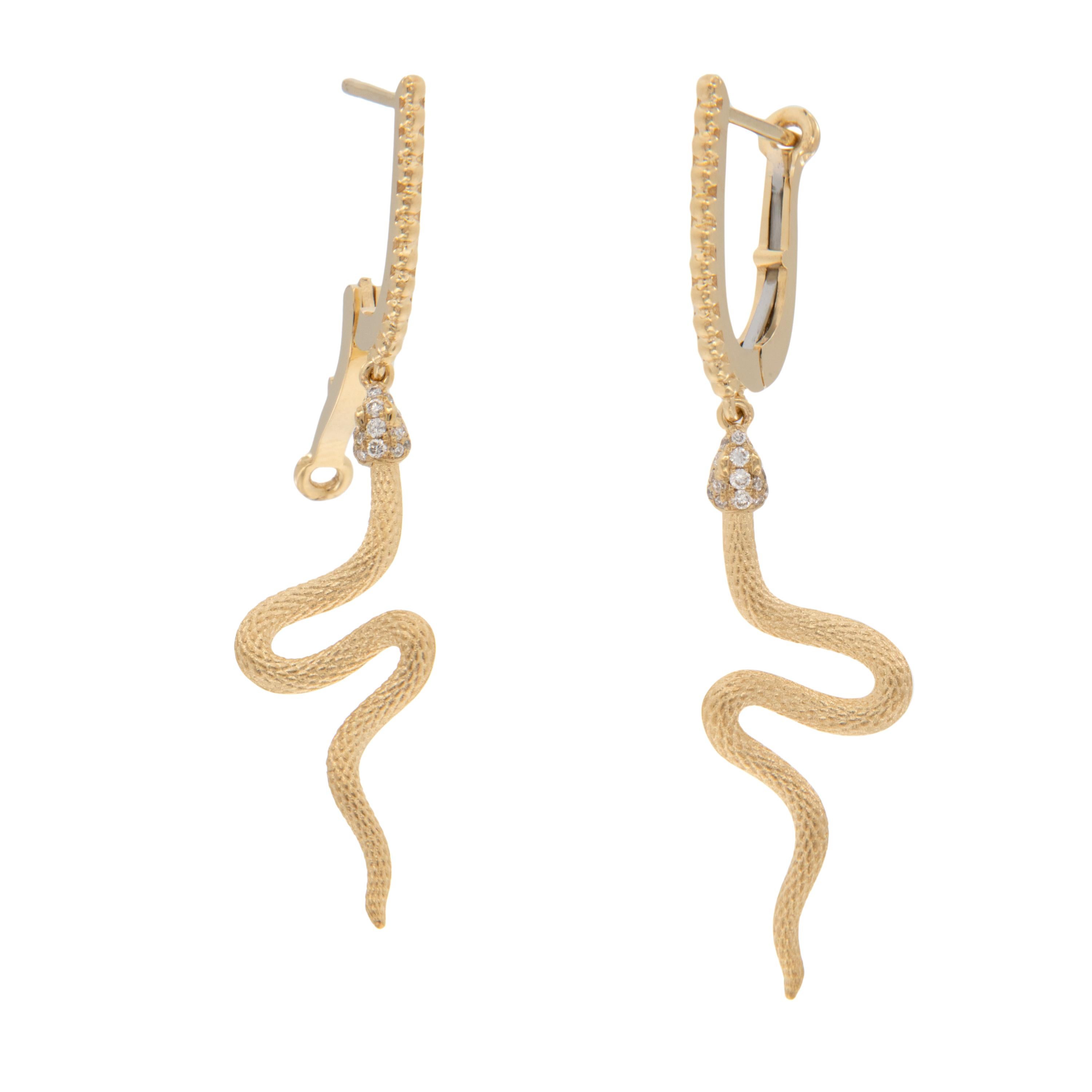 Serpents have been an iconic symbol in jewelry for ages from Cleopatra to Queen Victoria’s trendsetting engagement ring where the snake became a symbol for eternal love and commitment. These lovely serpent earrings with 0.11 cttw diamond eyes and