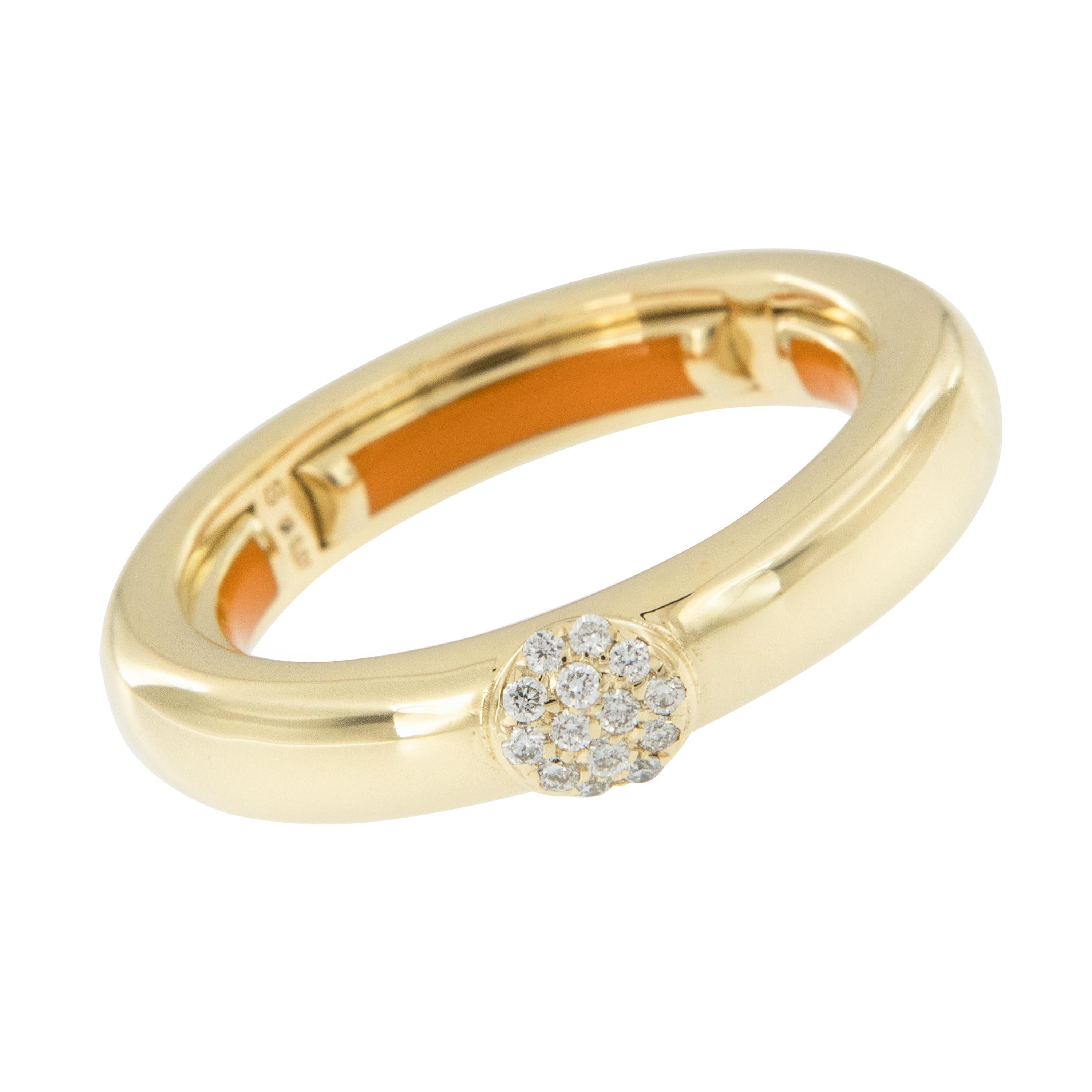 Bold, bright and beautiful! This contemporary ring is hand-crafted in Italy for Campanelli & Pear. Ring is 18k yellow gold featuring 0.07 Cttw pave' set diamonds in round center. The ring features a unique adjustable innerspring to fit 5-6.5 ring