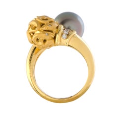 18 Karat Yellow Gold Diamond and Black Pearl Dolphin Ring