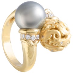 18 Karat Yellow Gold Diamond and Black Pearl Dolphin Ring
