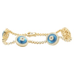 18 Karat Yellow Gold Diamond and Blue Enamel Evil Eye Bracelet