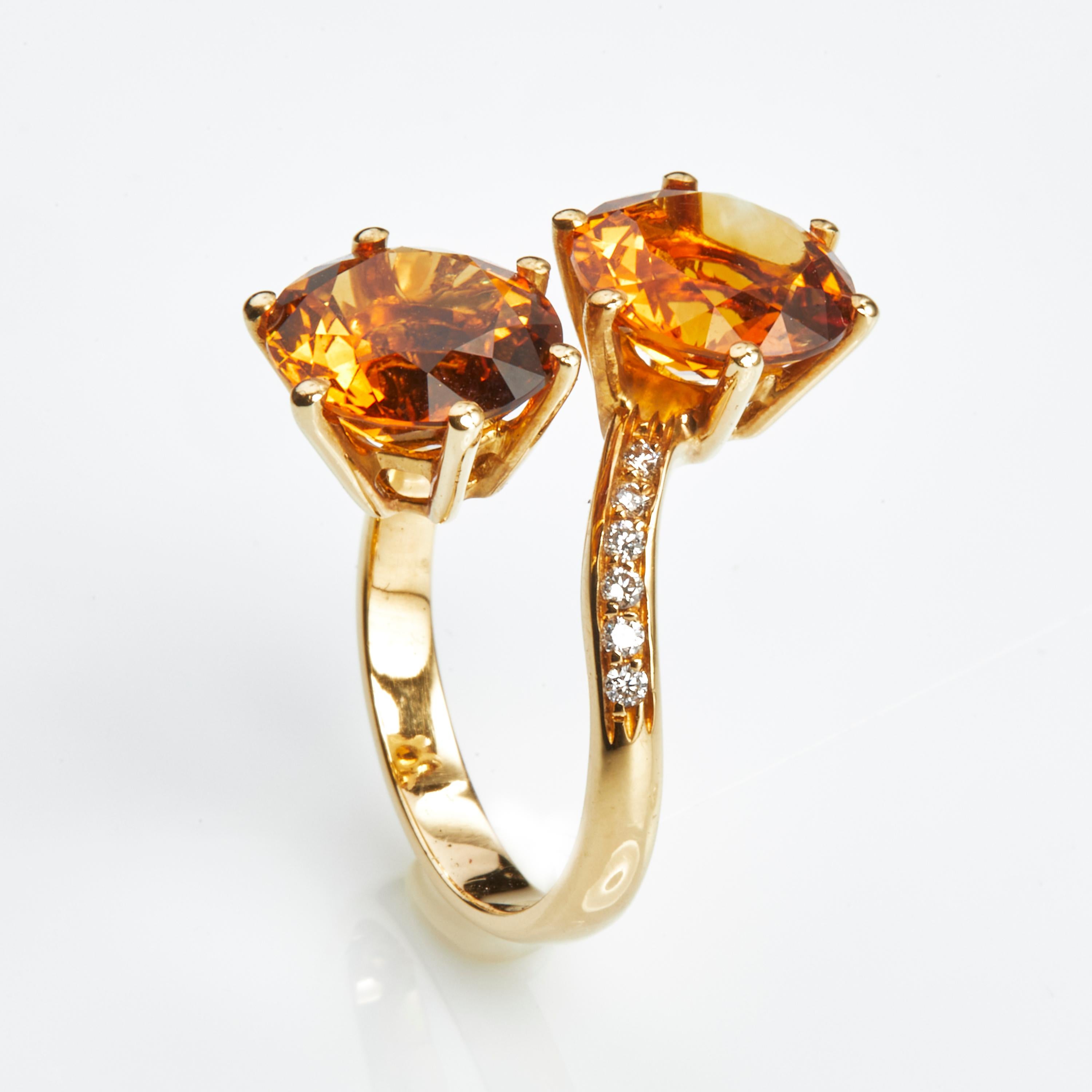 18 Karat Yellow Gold Diamond and CitrineCoktail Ring
12 Diamonds 0.15 Carat
2 Citrines 5.85 Carat

Size 55 US 7.2

Founded in 1974, Gianni Lazzaro is a family-owned jewelery company based out of Düsseldorf, Germany.
Although rooted in Germany,