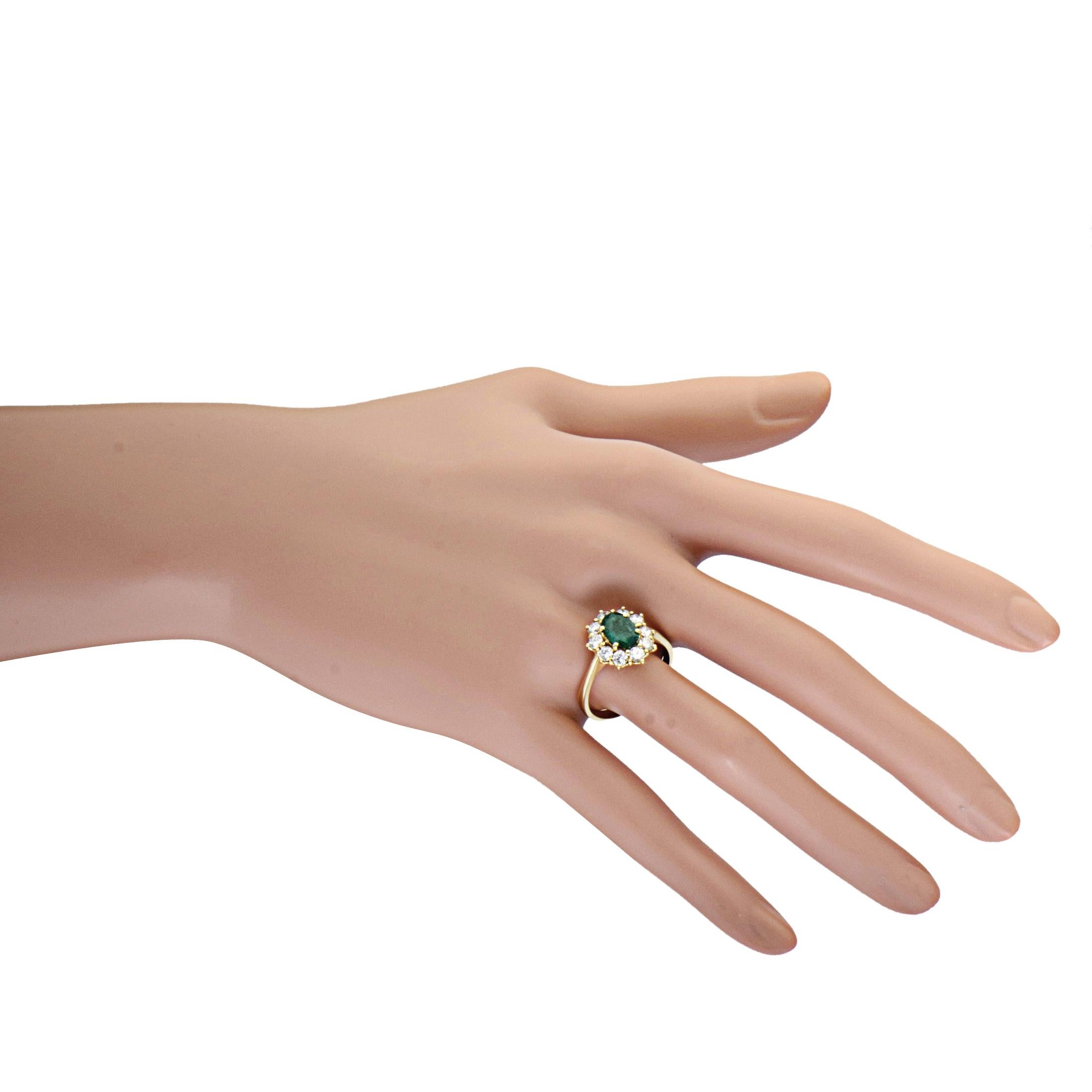 Women's 18 Karat Yellow Gold Diamond and Oval Emerald Ring