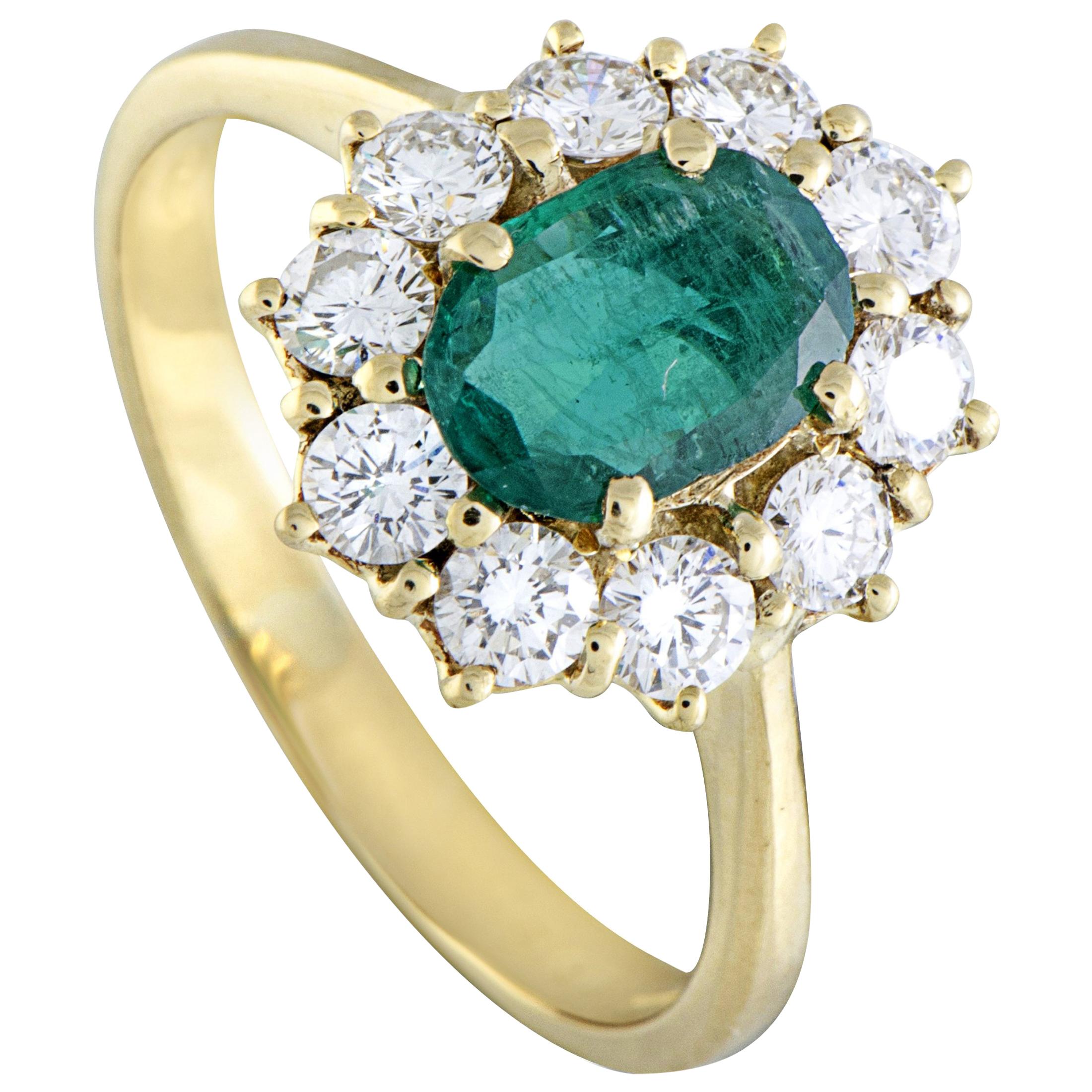 18 Karat Yellow Gold Diamond and Oval Emerald Ring