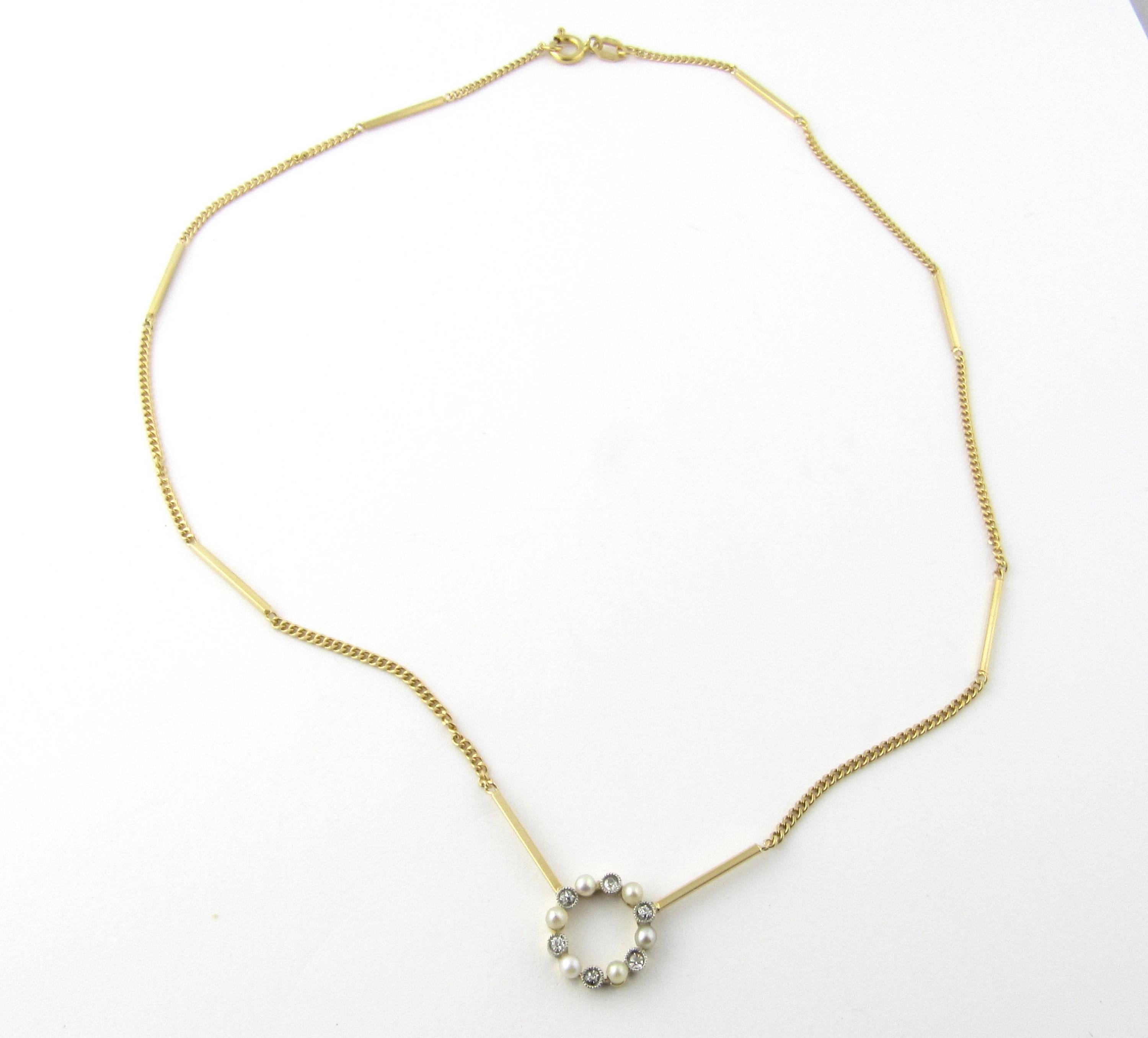 Vintage 18 Karat Yellow Gold Diamond and Pearl Necklace- 
This lovely necklace features six seed pearls and six single cut diamonds in a circle design on a beautiful Italian link chain. Center piece measures 11 mm. 
Size: 15.5 inches 
Weight: 3.0
