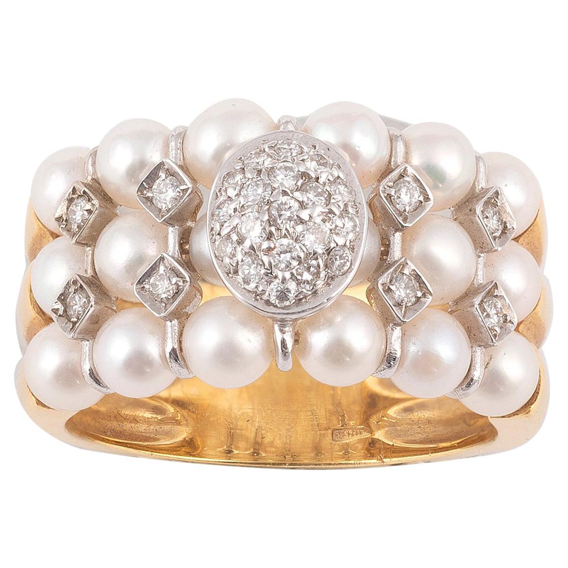 Bague en or jaune 18 carats avec diamants et perles