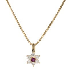 18 Karat Yellow Gold Diamond and Ruby Flower Necklace