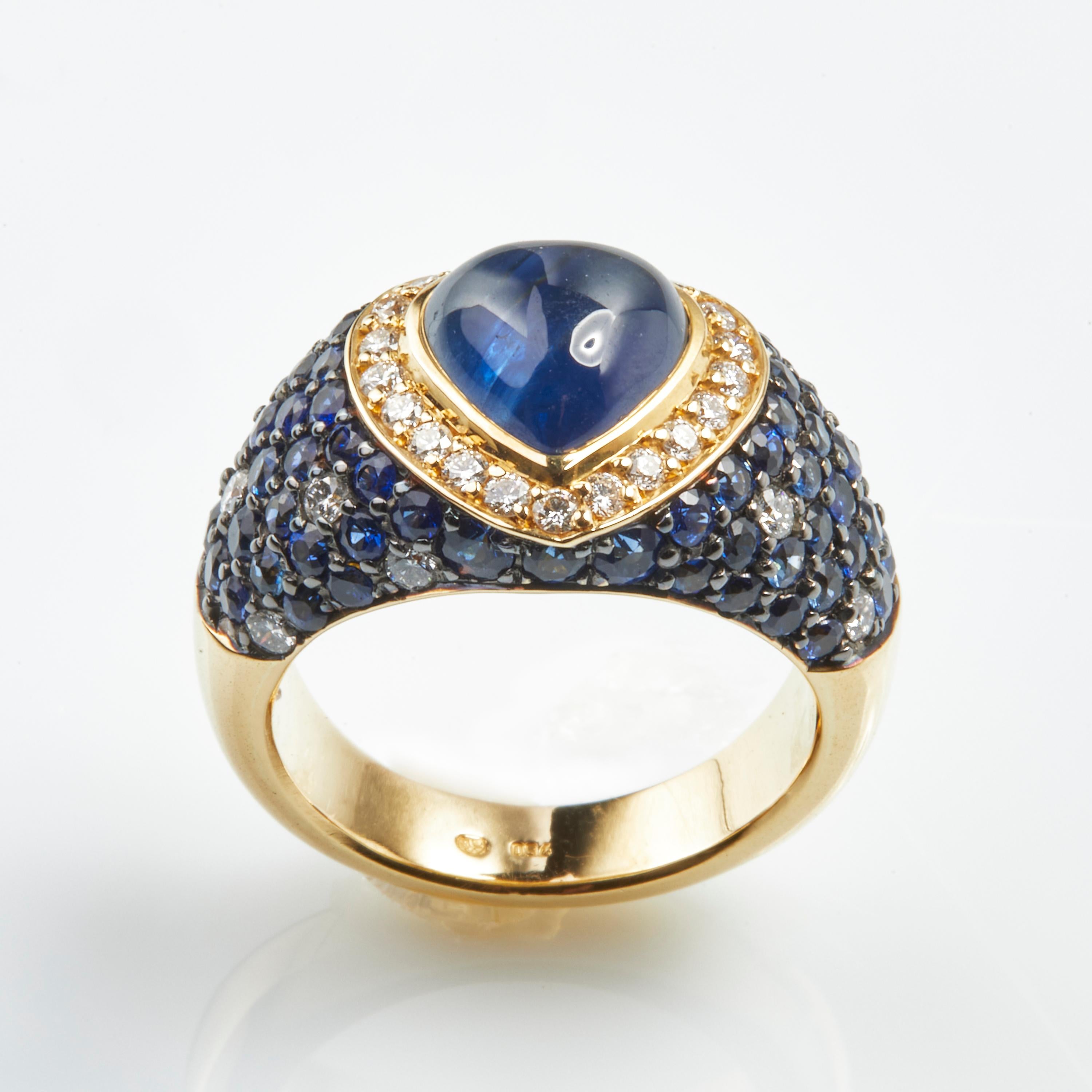 18 Karat Yellow Gold Diamond and Sapphire Coktail Ring
30 Diamonds 0.69 Carat
27 sappire  2.94 Carat
1 sapphire  cab. 3.46 ct.
Size 56 US 7.6

Founded in 1974, Gianni Lazzaro is a family-owned jewelery company based out of Düsseldorf,
