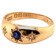 18 Karat Yellow Gold Diamond and Sapphire Star Bezel Gypsy Set Ring
