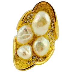 18 Karat Yellow Gold, Diamond and South Sea Pearl Saddle Ring