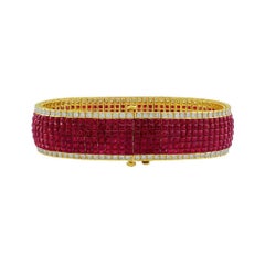 18 Karat Yellow Gold Diamond and Synthetic Ruby Invisible Set Bracelet