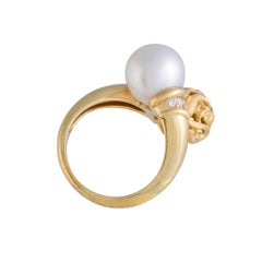 18 Karat Yellow Gold Diamond and White Pearl Dolphin Ring