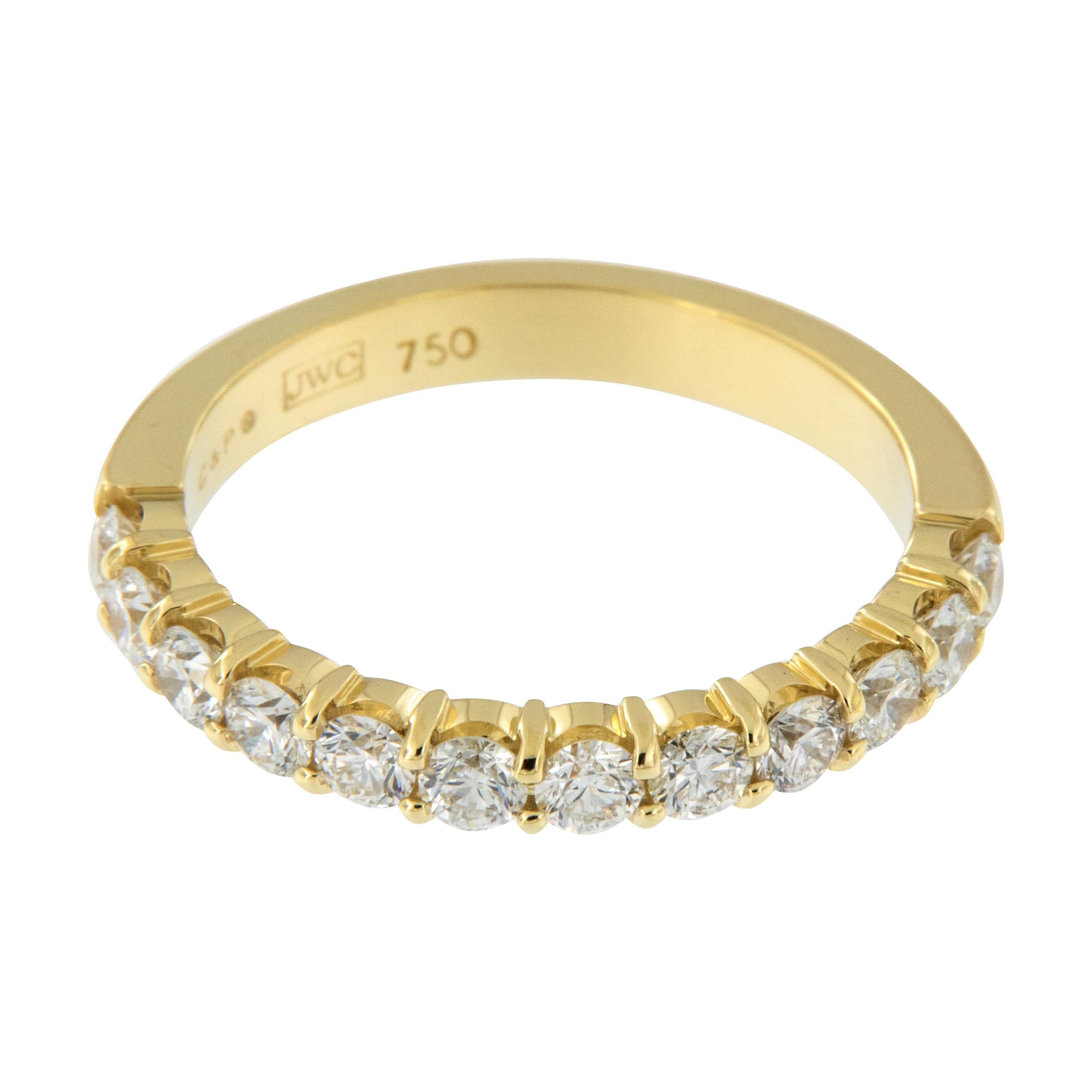 What could be a more perfect gift to commemorate your anniversary than this timeless diamond band? Rich 18 karat yellow gold and over 3/4 Cttw of diamonds showcased across the top makes this a statement piece you can wear every day or dress up your