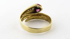18 Karat Yellow Gold Diamond Back Snake Ring with Ruby Eyes Ring