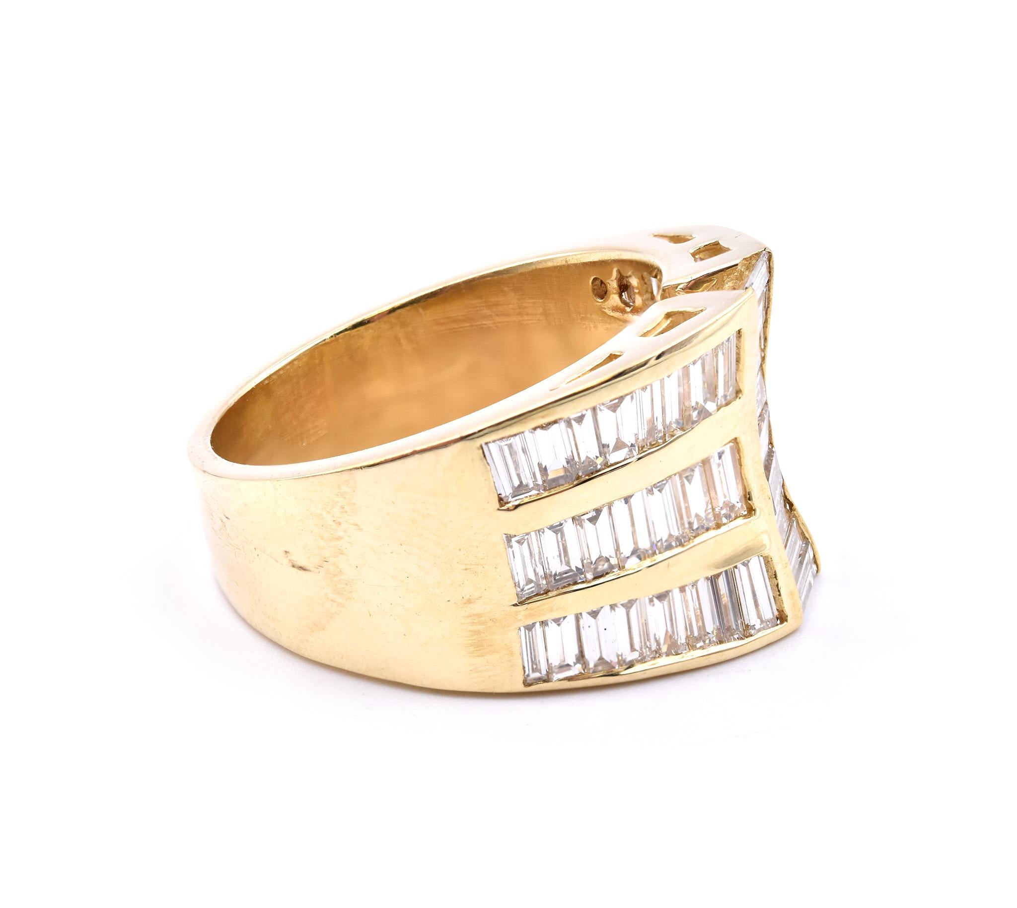 Designer: custom
Material: 18K yellow gold
Diamonds: 51 baguette cut = 2.50cttw
Color: G
Clarity: VS
Ring Size: 10 (Please allow up to two additional business days for sizing requests)
Dimensions: ring top measures 15.17mm wide  
Weight: 16.25 grams