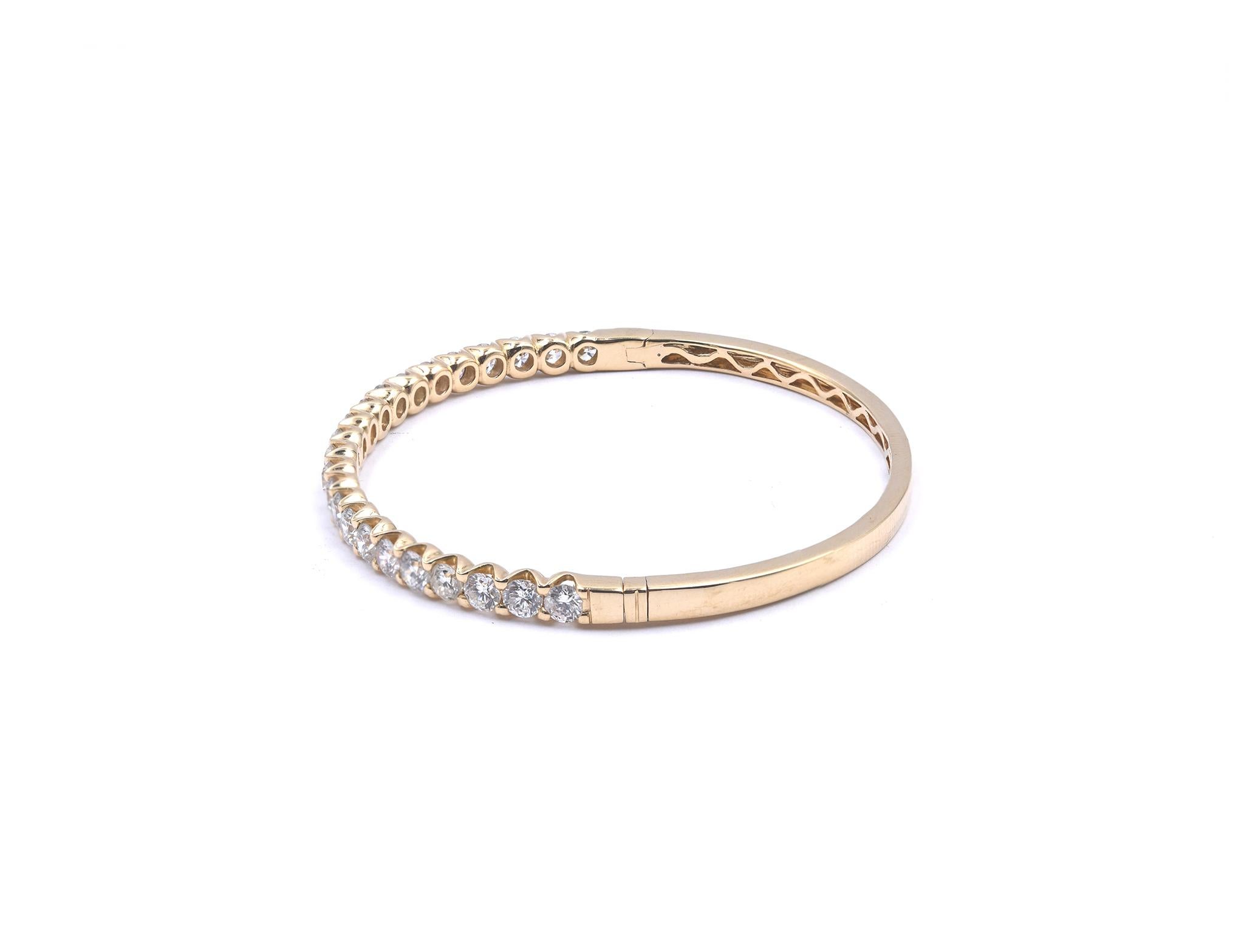 Material: 18K yellow gold
Diamonds: 23 round brilliant cut = 4.95cttw
Color: G
Clarity: VS2
Dimensions: bracelet will fit up to a 6.5-inch wrist
Weight: 15.75 grams
