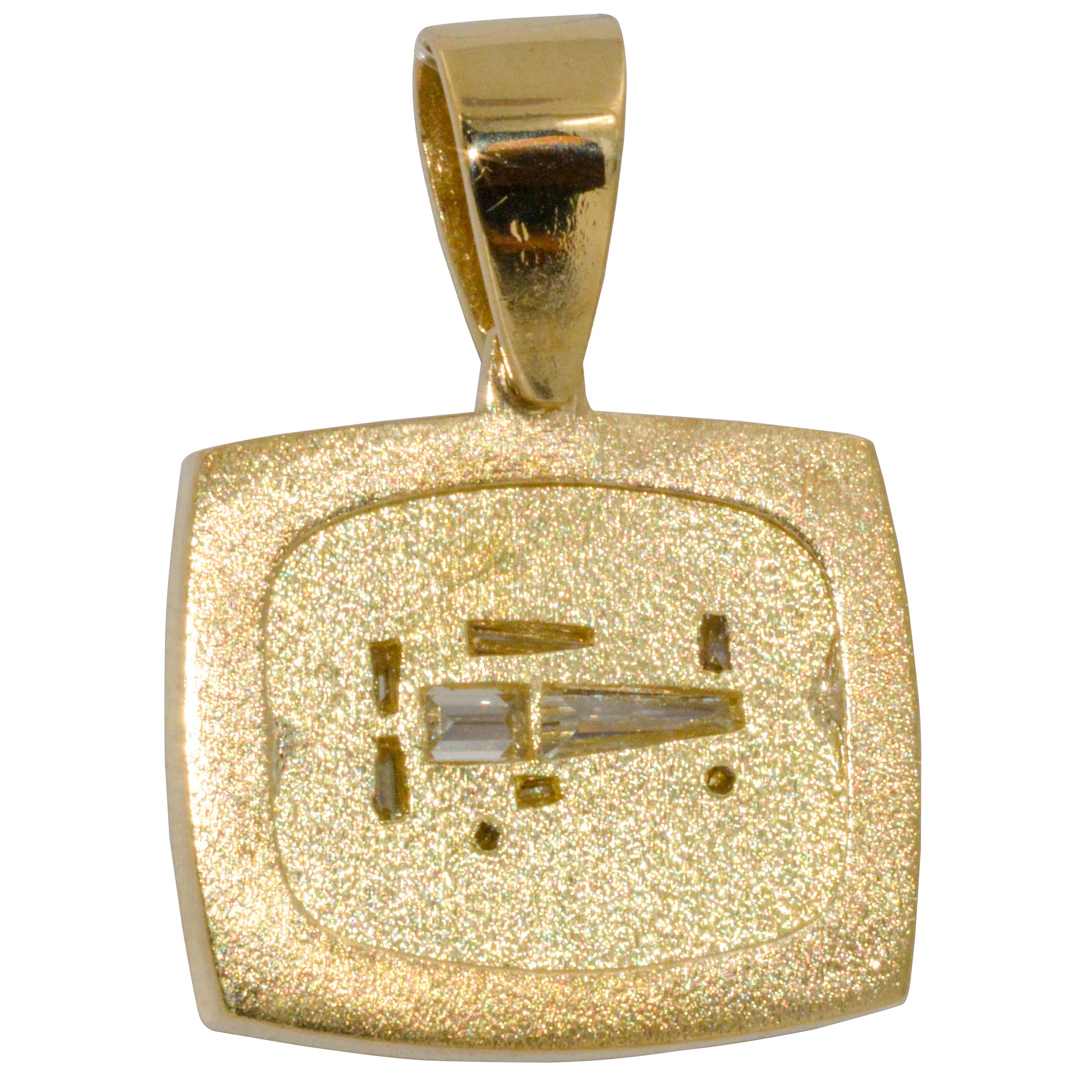 The beauty is in the details of this baguette diamond bi-plane motif pendant. 18 karat yellow gold. 6 tapered baguette diamonds .20 carat total weight. 2 round brilliant cut diamonds (G color, VS internal clarity). 3/4 inch (2 cm) wide.