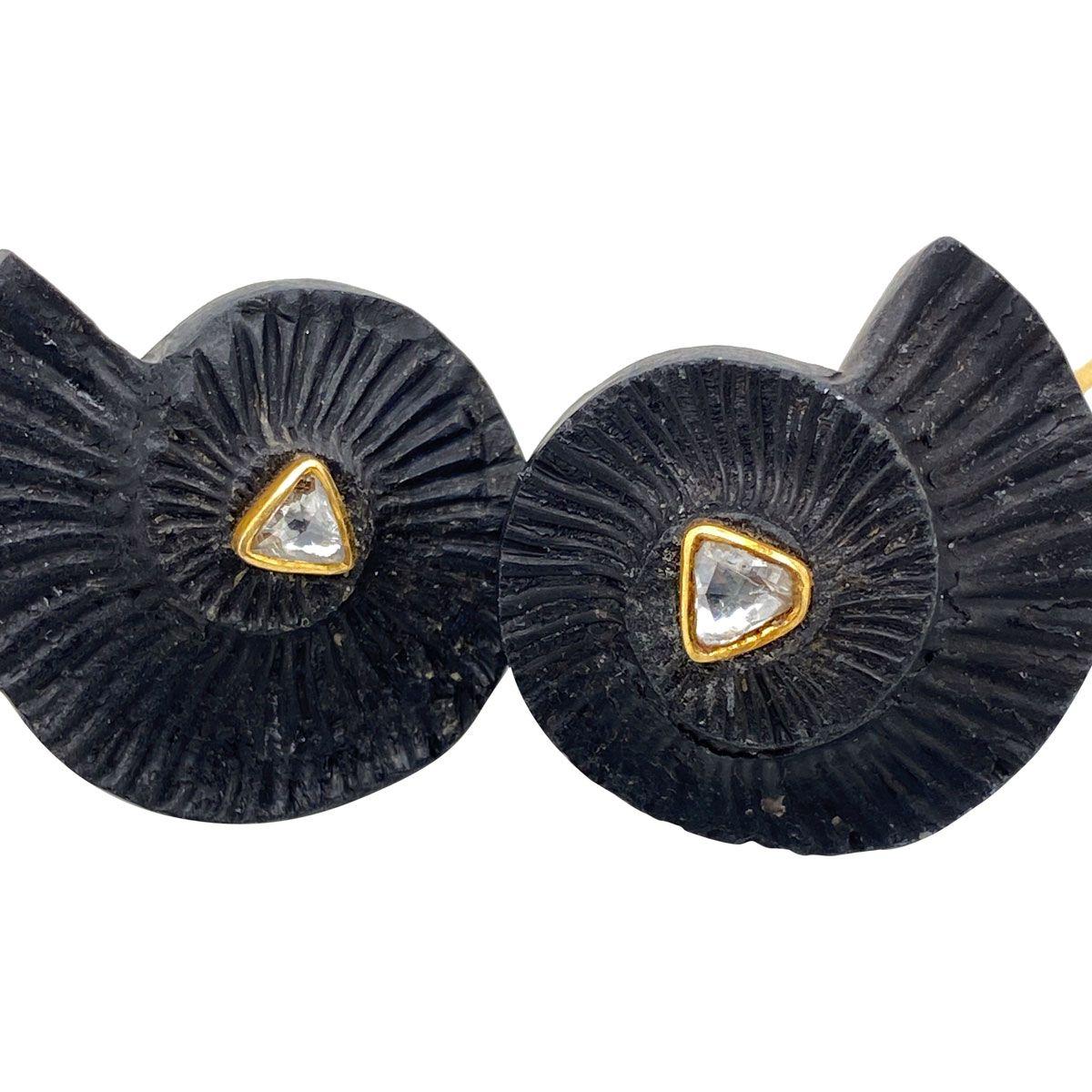 Unique creations made from three elements of the earth, diamonds, lava and gold. Beautifully crafted with such style and sophistication, you will be the only one with earrings like this. The lava stone is molded into the shape of circular conical