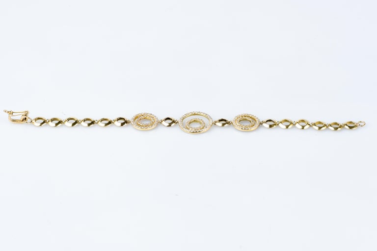 18 karat yellow gold diamond bracelet designed with 136 round brilliant cut diamonds weighing 1.36 carat.      

Quality of the diamond
Color: H
Clarity : SI

Weight : 13.00 gr.

Dimensions : 18 x 0.20 cm

Marked 18 carats gold hallmark on the