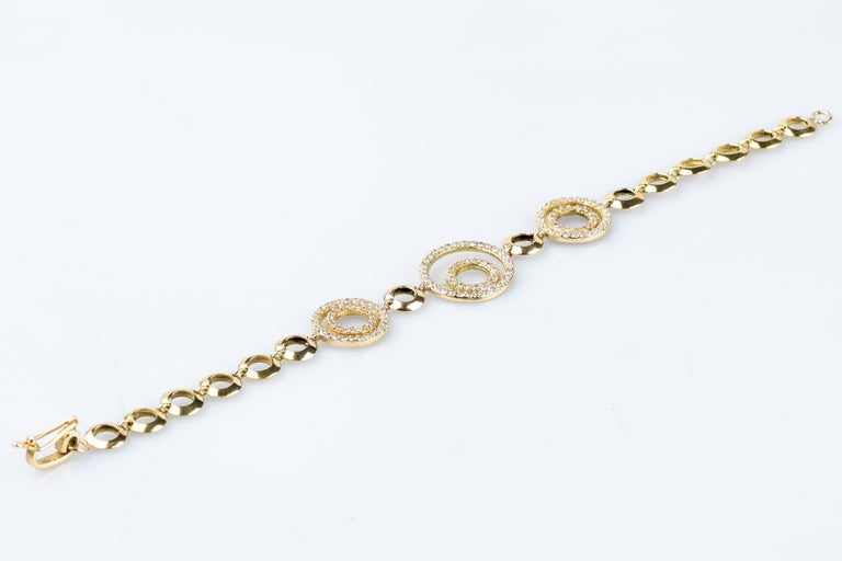 18 karat yellow gold diamond bracelet designed with round brillant cut diamonds For Sale 1