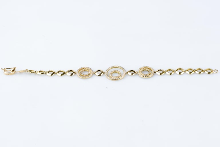 18 karat yellow gold diamond bracelet designed with round brillant cut diamonds For Sale 2