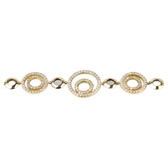 18 karat yellow gold diamond bracelet designed with round brillant cut diamonds