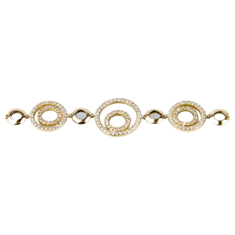 18 karat yellow gold diamond bracelet designed with round brillant cut diamonds For Sale