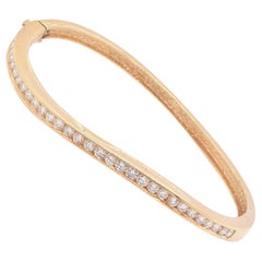 18 Karat Yellow Gold Diamond Channel Set Bangle Bracelet