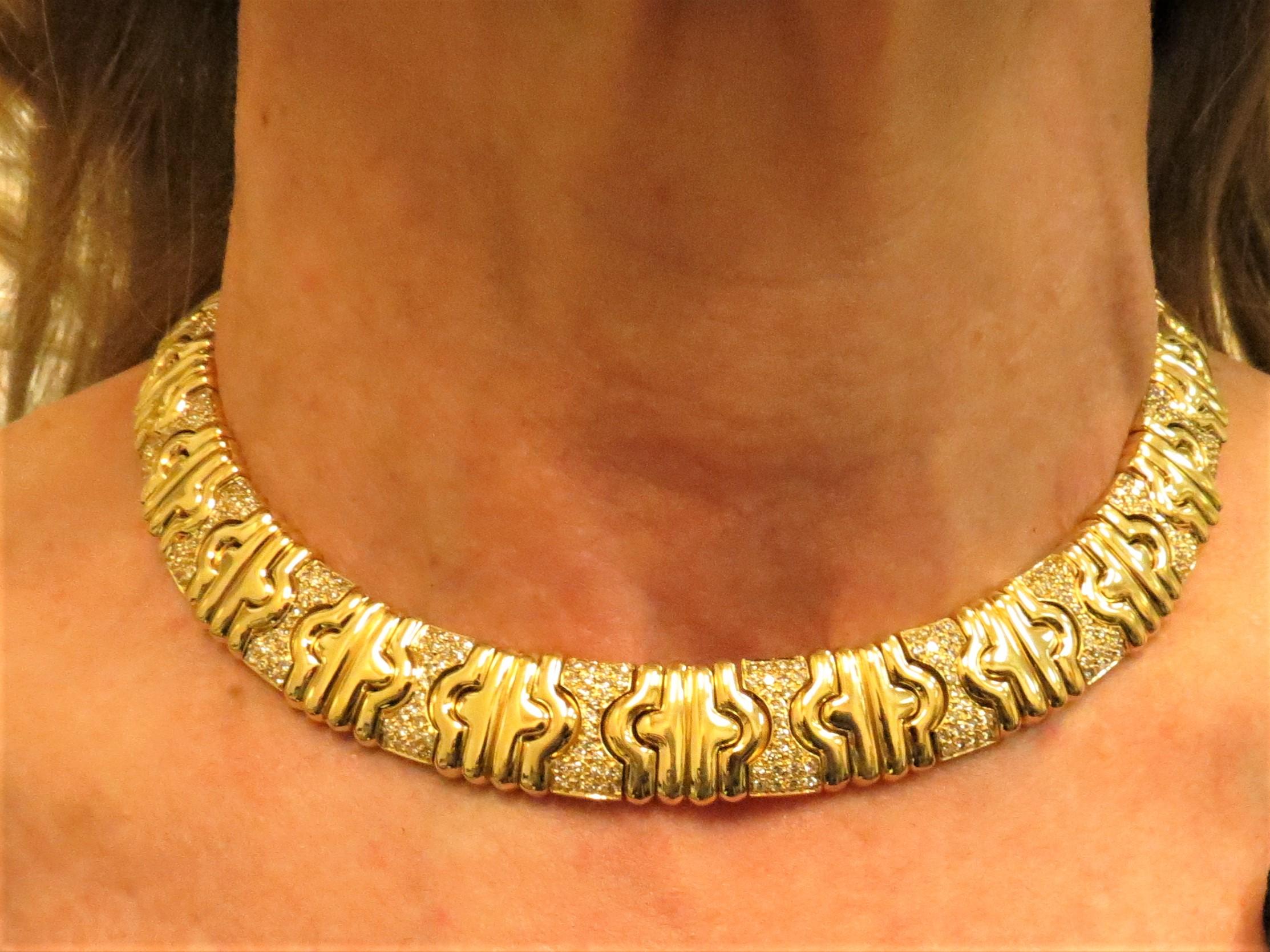 18K yellow gold choker necklace set with 264 full cut round diamonds weighing 4.45cts, GH color, VS clarity. 16 inch length.
Last retail $22500