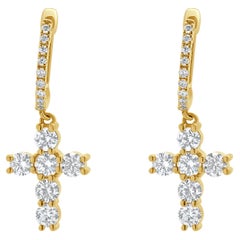 Boucles d'oreilles pendantes croix en or jaune 18 carats avec diamants