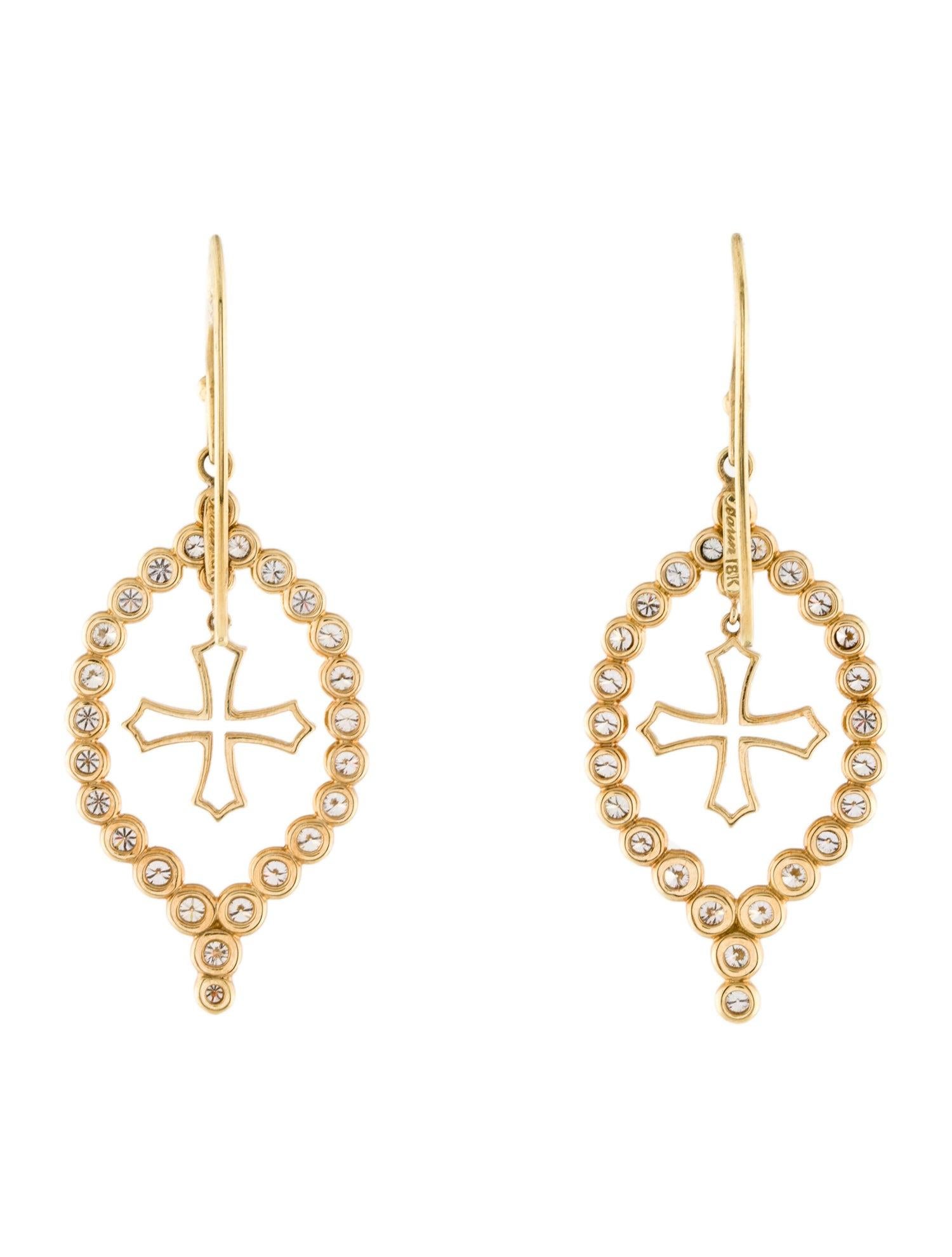 These stunning 18 Karat Yellow Gold Diamond Cross Earrings are a true work of art. Each earring features a beautiful cross design that is adorned with 2.30cts of Round Brilliant Diamonds. These diamonds sparkle and shine, catching the light