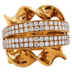Breiter Ring aus 18 Karat Gelbgold mit Diamanten im geschwungenen Stil