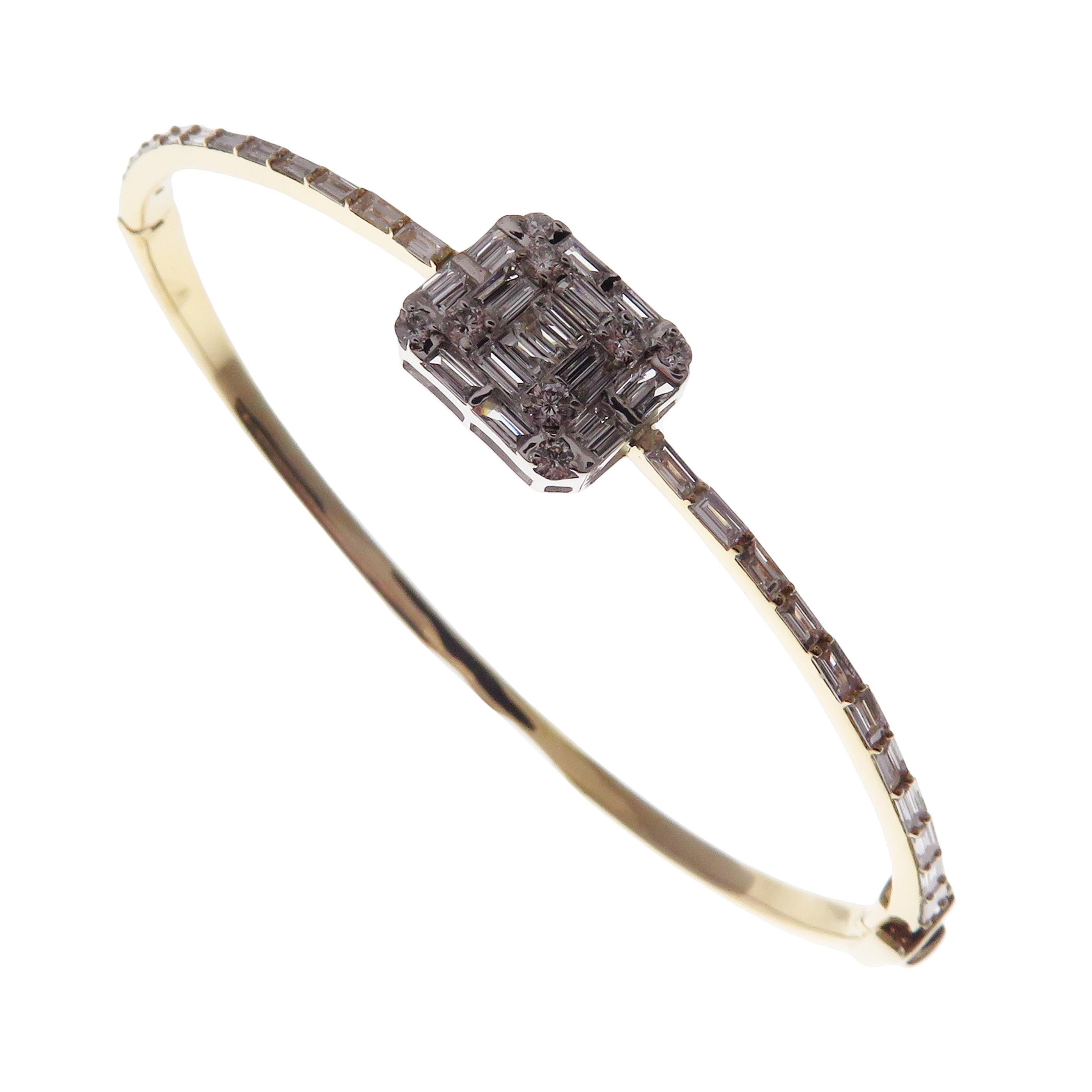 This delicate square baguette bangle is crafted in 18-karat yellow gold, weighing approximately 1.37 total carats of V-Quality white diamond. Side clasp closure. 

Fits wrists up to 6.75