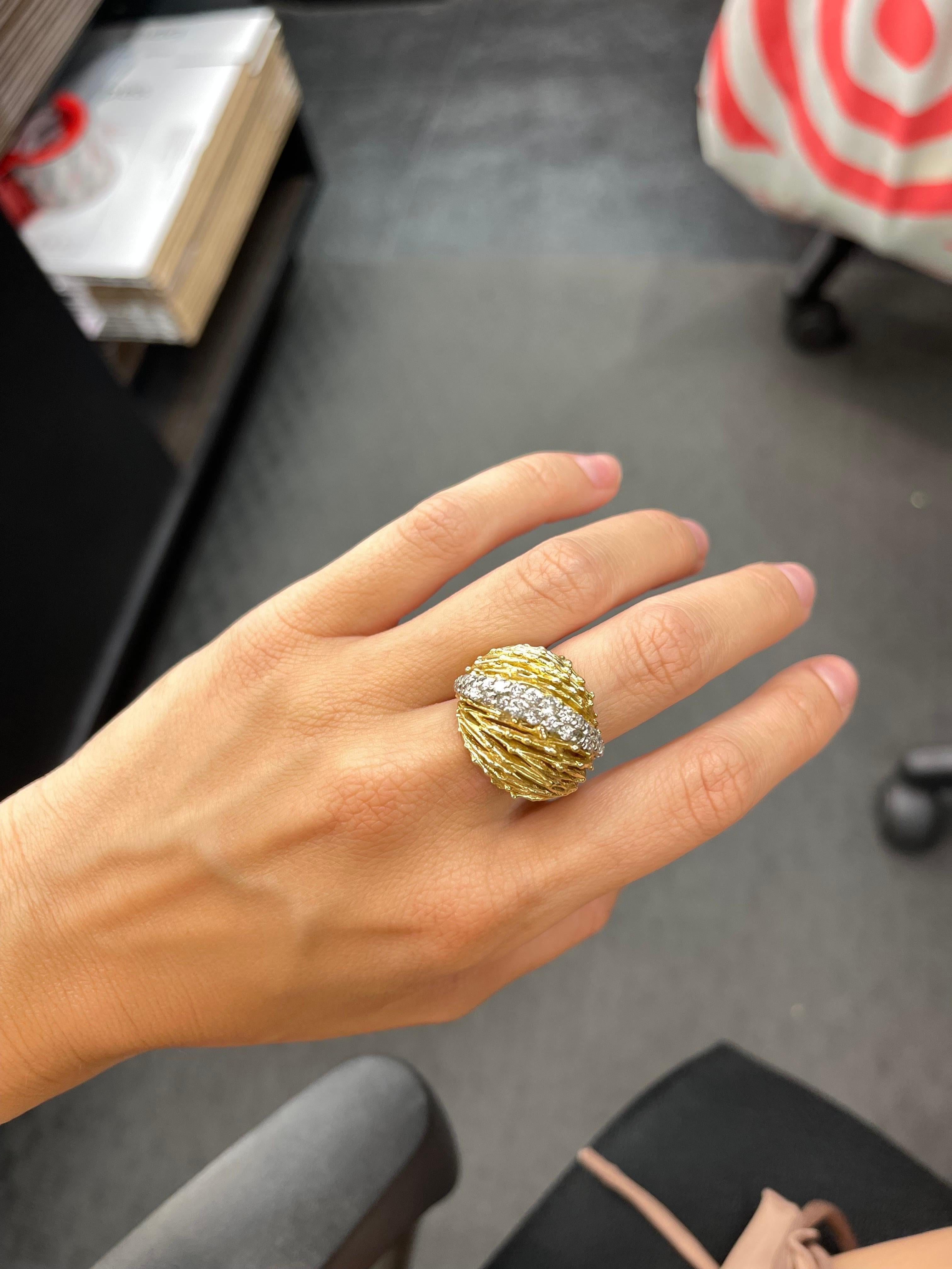 18 Karat Yellow gold dome ring featuring 33 round brilliants weighing approximately 0.60 carats, 17.1 grams. 
