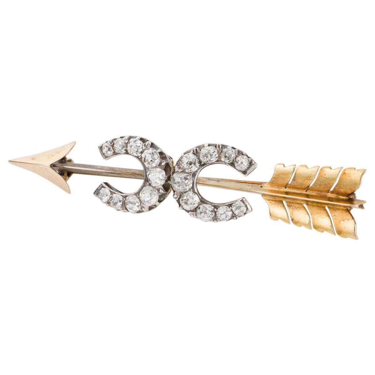 Victorian 18 Karat Yellow Gold Diamond Double Horseshoe Arrow Brooch For Sale